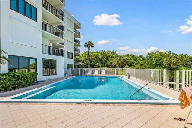 community pool with fence