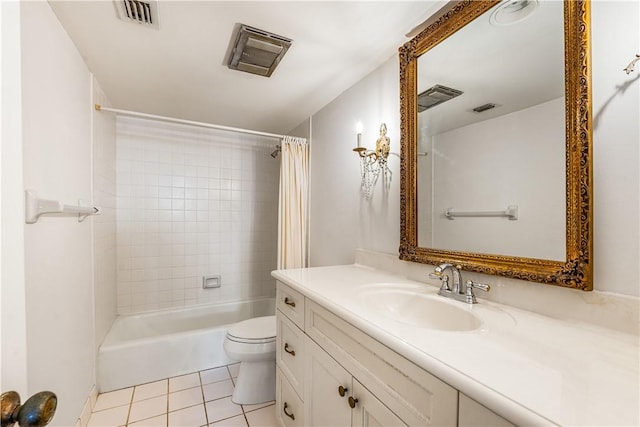 bathroom featuring toilet, tile patterned floors, vanity, and shower / tub combo with curtain