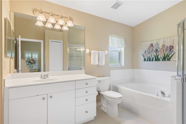 full bathroom with toilet, vanity, tile patterned flooring, and separate shower and tub