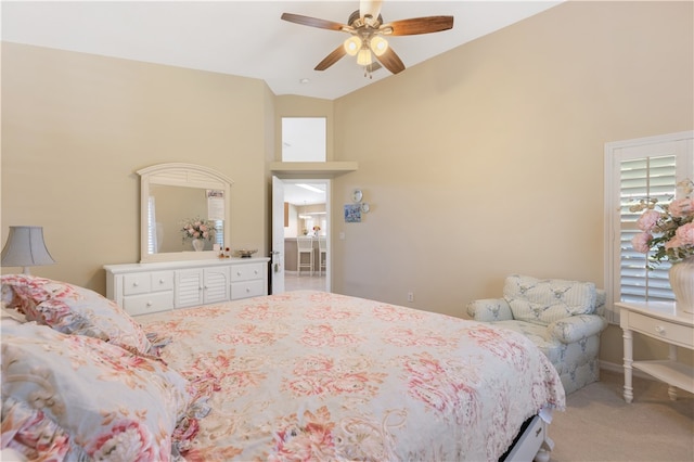 bedroom featuring high vaulted ceiling, ceiling fan, and carpet floors