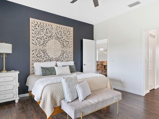 bedroom featuring ceiling fan and dark hardwood / wood-style floors