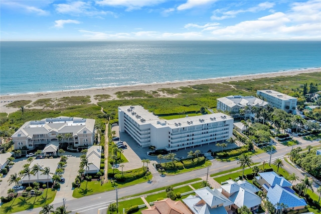 aerial view with a view of the beach and a water view