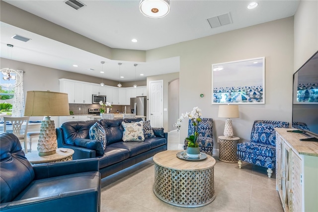 living room with light tile patterned flooring