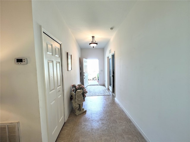 corridor with baseboards