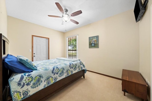 bedroom with baseboards, carpet flooring, and ceiling fan