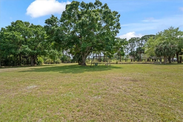 view of yard featuring playground community