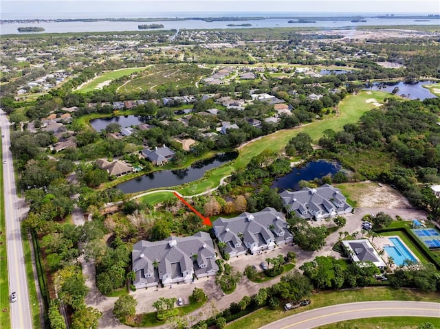 drone / aerial view with a water view