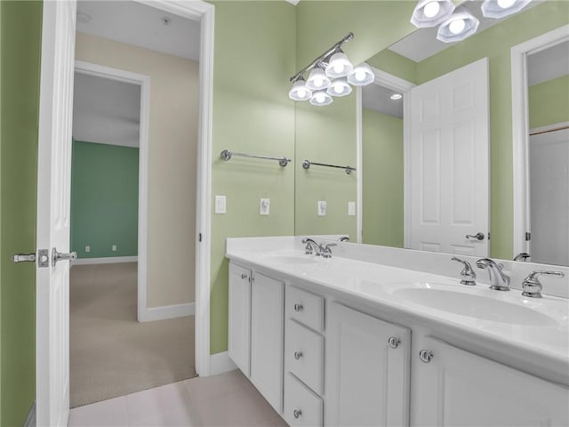 bathroom with vanity and tile patterned floors