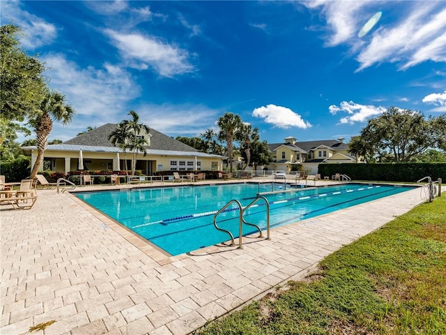 view of swimming pool featuring a patio