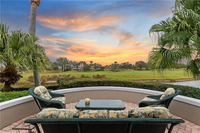 view of patio terrace at dusk