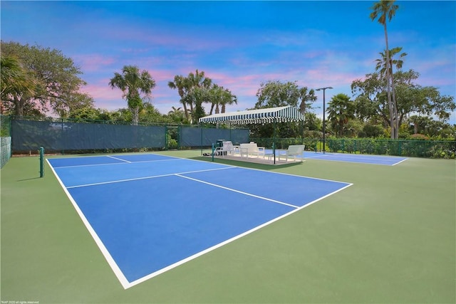 view of sport court with basketball hoop