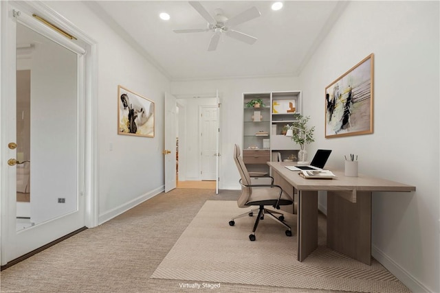 home office with ceiling fan and light colored carpet