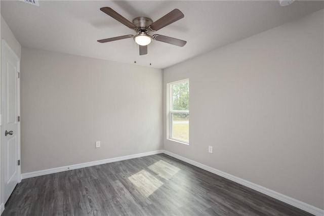 901 Brickell St SE, Palm Bay, FL 32909 - unfurnished room with dark wood-type flooring and ceiling fan