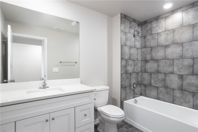 901 Brickell St SE, Palm Bay, FL 32909 - bathroom featuring vanity, shower / tub combination, and wood finished floors