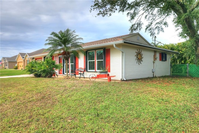 ranch-style house with a front yard