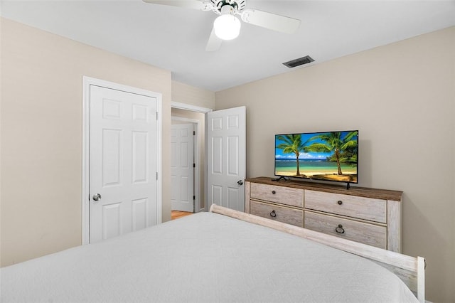 bedroom featuring visible vents and ceiling fan