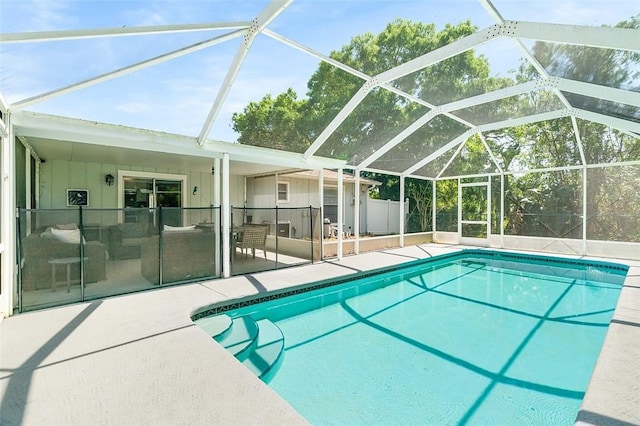 view of swimming pool featuring a fenced in pool and a patio