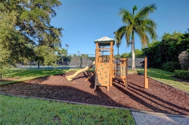 view of play area with a yard