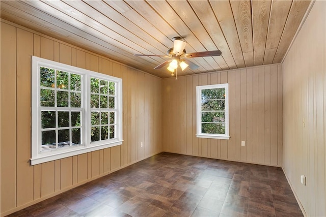 spare room with wooden ceiling and ceiling fan