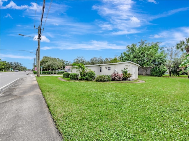 exterior space with a front yard