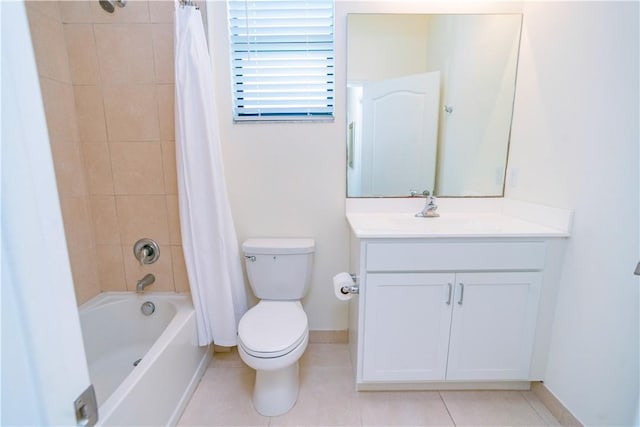 full bathroom with tile patterned floors, vanity, shower / tub combo, and toilet