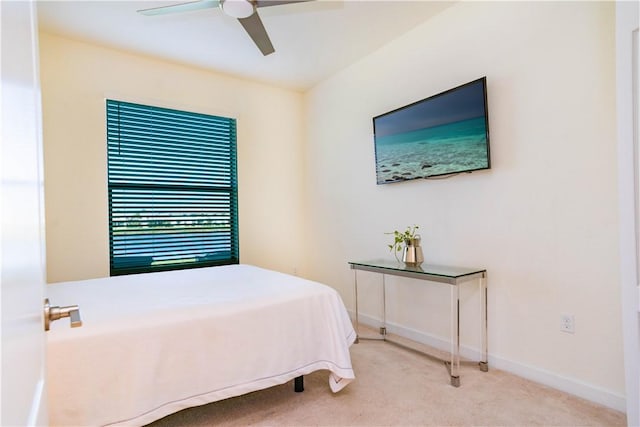 bedroom featuring carpet and ceiling fan