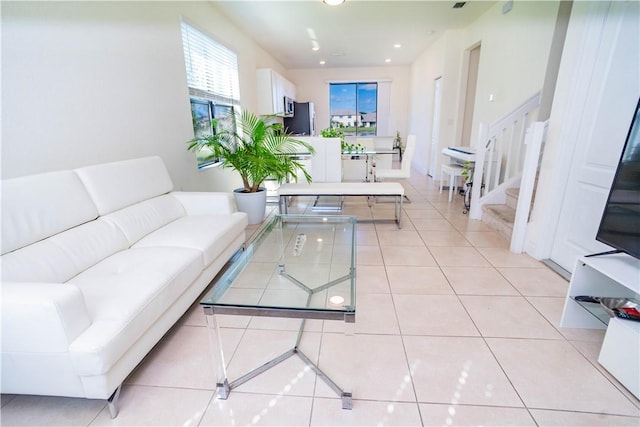 living room with light tile patterned flooring