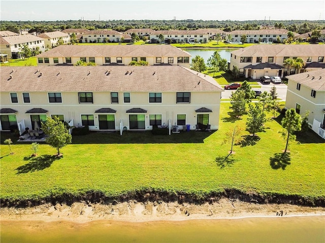 bird's eye view with a water view