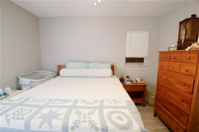 bedroom featuring light hardwood / wood-style floors