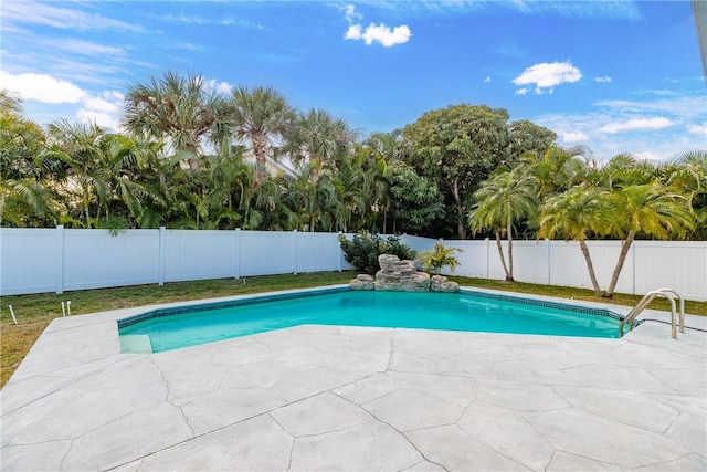 view of pool featuring a patio