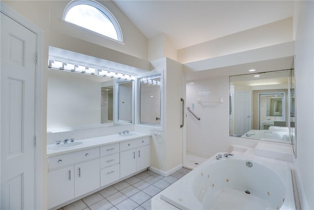 bathroom featuring tile patterned floors, vanity, plus walk in shower, and vaulted ceiling