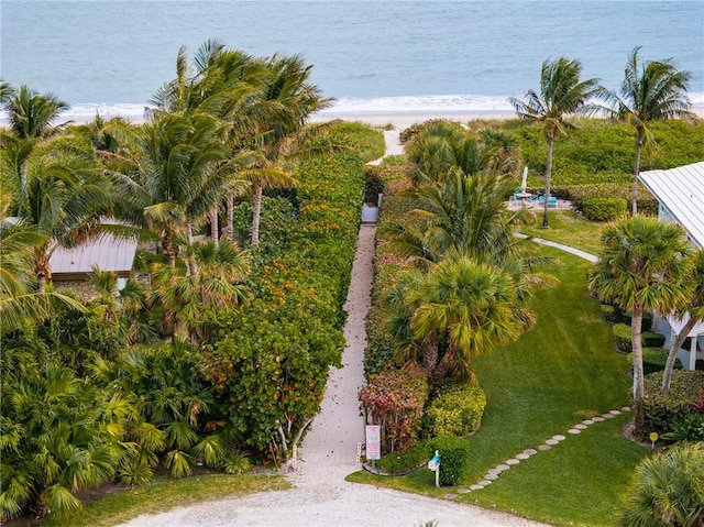 aerial view with a water view and a beach view