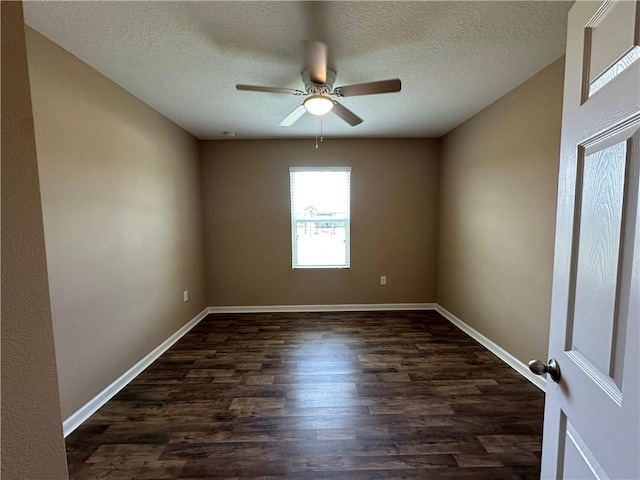 3315 Rockport St SW, Vero Beach, FL 32968 - spare room with dark wood-style floors, a textured ceiling, and a ceiling fan