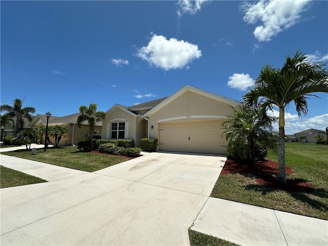 3315 Rockport St SW, Vero Beach, FL 32968 - ranch-style home featuring a garage, driveway, a front yard, and stucco siding
