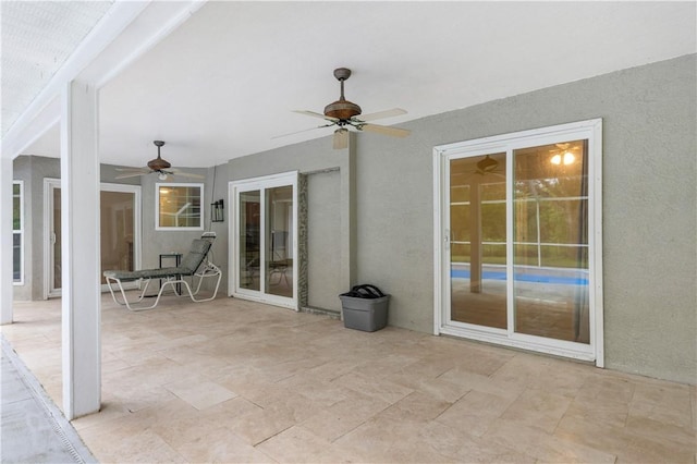 view of patio featuring a ceiling fan