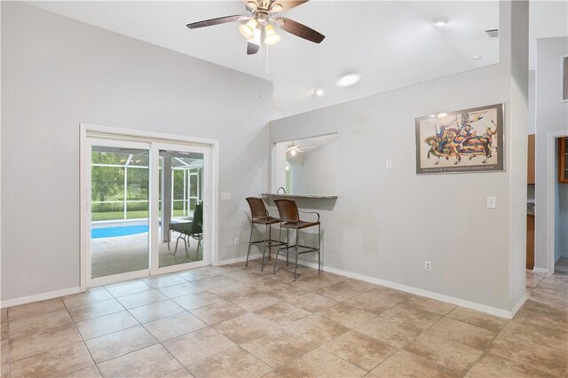 kitchen with vaulted ceiling, sink, a wealth of natural light, and black appliances