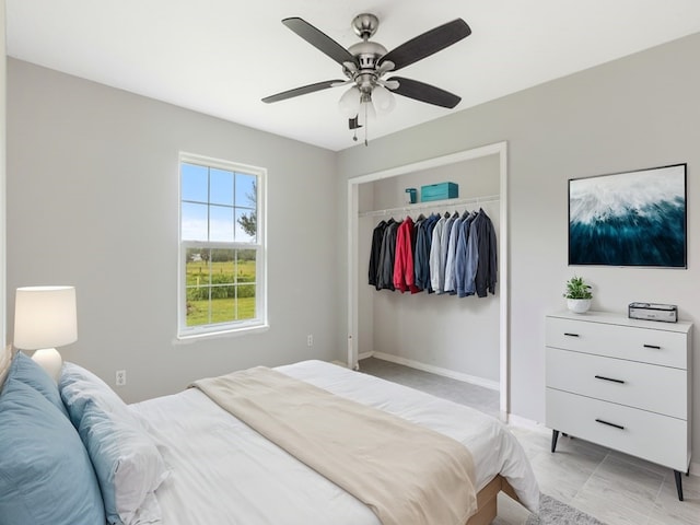 bedroom with a closet and ceiling fan