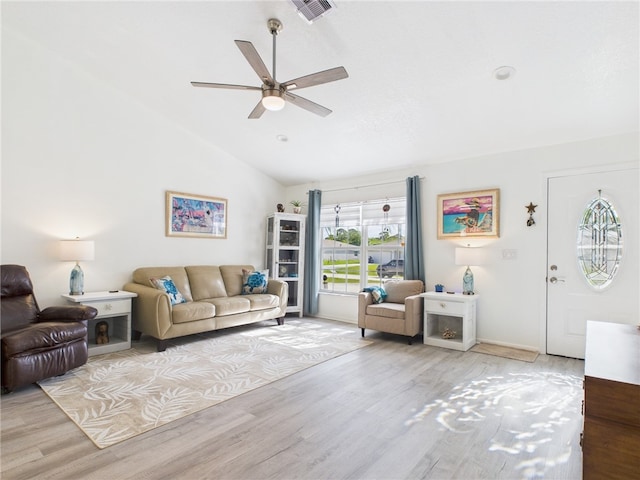 7965 105th Ave, Vero Beach, FL 32967 - living area featuring vaulted ceiling, ceiling fan, and wood finished floors