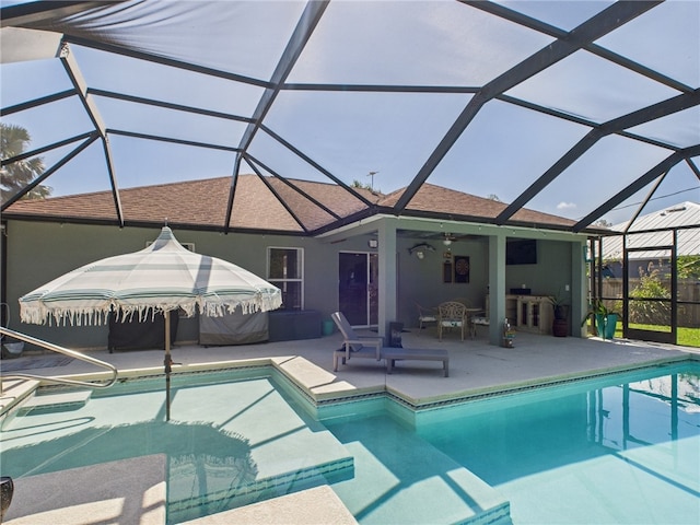 7965 105th Ave, Vero Beach, FL 32967 - outdoor pool with a patio, glass enclosure, and ceiling fan