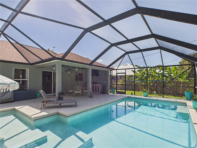 7965 105th Ave, Vero Beach, FL 32967 - view of pool featuring a patio, a ceiling fan, and glass enclosure