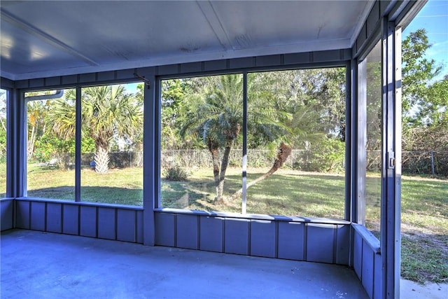 unfurnished sunroom featuring a healthy amount of sunlight