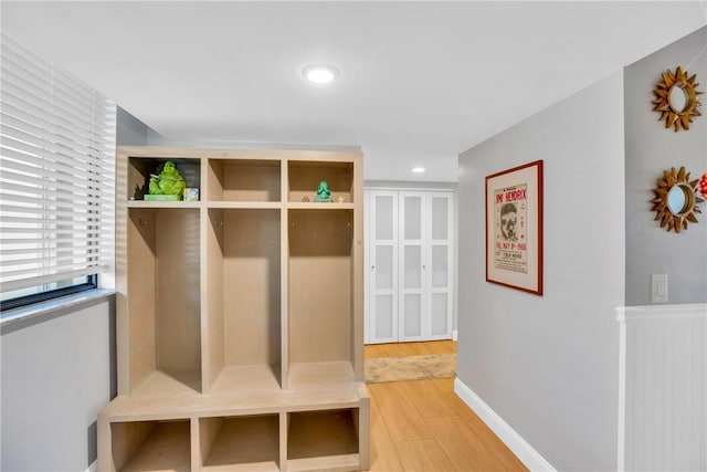 mudroom with hardwood / wood-style floors