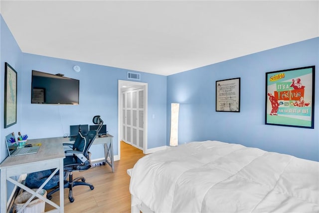 bedroom featuring light hardwood / wood-style flooring