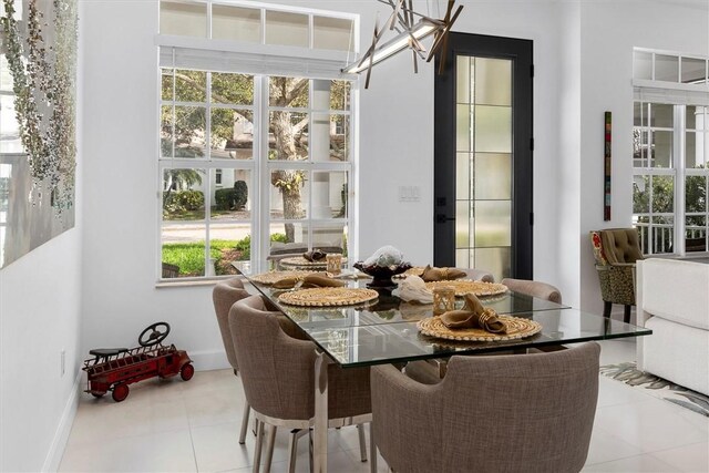 1715 N Orchid Island Cir, Vero Beach, FL 32963 - dining room with tile patterned flooring and baseboards