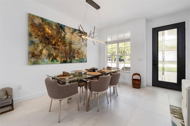 1715 N Orchid Island Cir, Vero Beach, FL 32963 - tiled dining area featuring baseboards