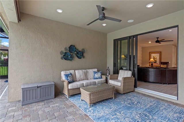 view of patio / terrace featuring a ceiling fan and outdoor lounge area