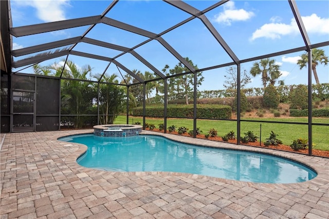 view of pool with a patio area, glass enclosure, a pool with connected hot tub, and a lawn