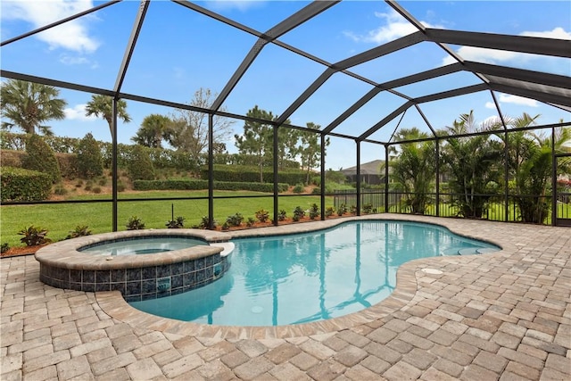 view of swimming pool featuring a yard, a pool with connected hot tub, a lanai, and a patio