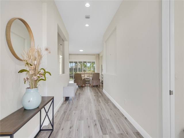 corridor featuring light hardwood / wood-style flooring