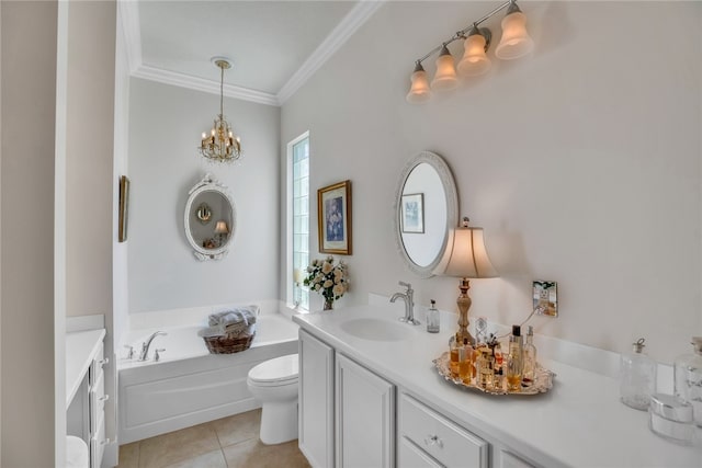 bathroom with crown molding, vanity, tile patterned flooring, toilet, and a washtub